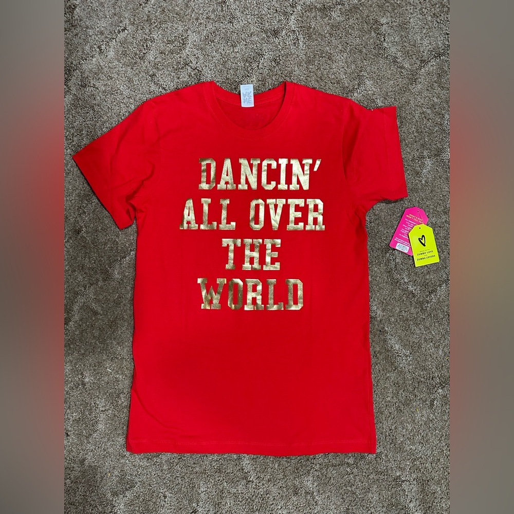 ZUMBA Dancin’ All Over the World Tee - Fits like a Medium, tag is XS/S.